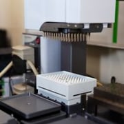 Mass spectrometry lab equipment in use.