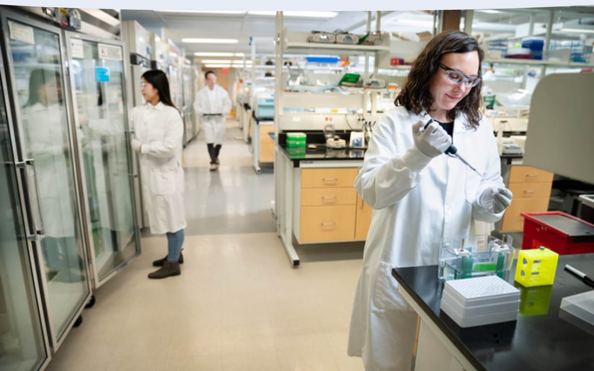 A scientist working in a lab.